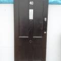 Reclaimed 4 panel door with vertival letterbox